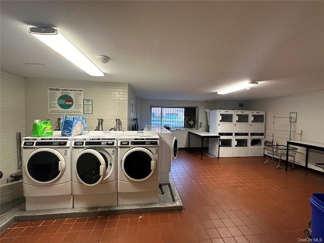 clothes washing area featuring independent washer and dryer and stacked washer / drying machine