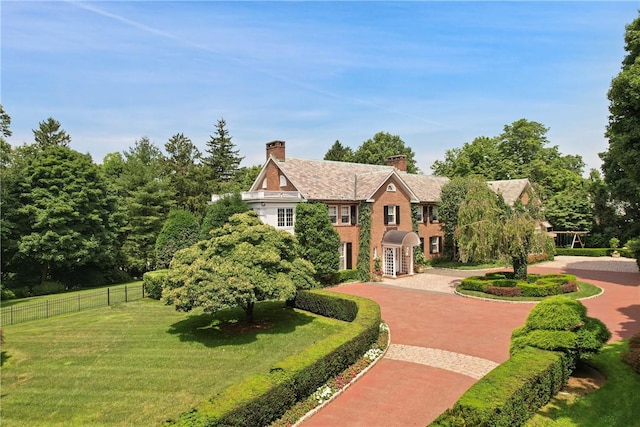 view of front of home with a front yard