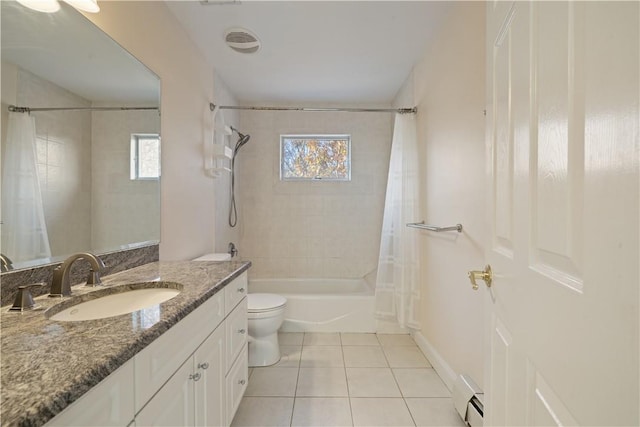 full bathroom with tile patterned flooring, shower / bathtub combination with curtain, plenty of natural light, and a baseboard heating unit