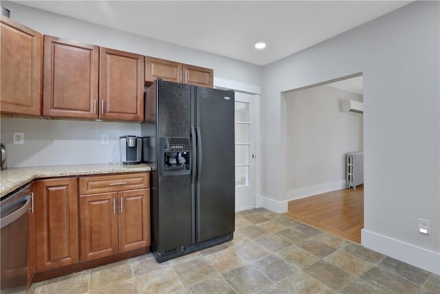 kitchen featuring radiator heating unit, black refrigerator with ice dispenser, a wall mounted AC, and stainless steel dishwasher