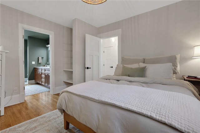 bedroom with light hardwood / wood-style flooring