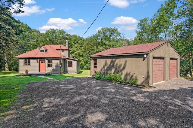 garage with a lawn