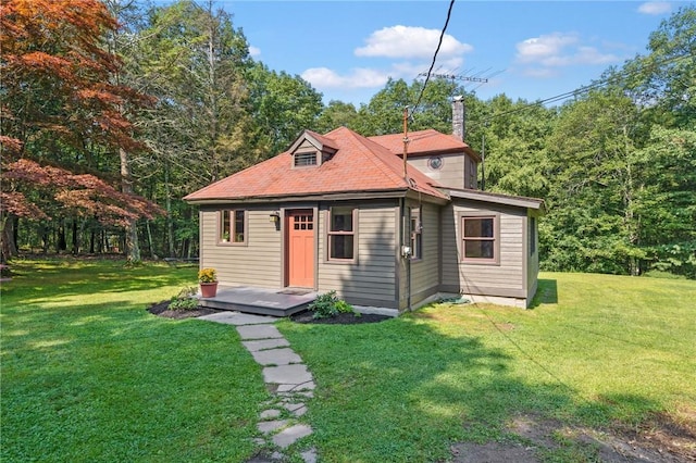 view of outdoor structure with a lawn