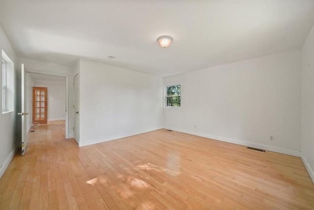 empty room with light wood-type flooring