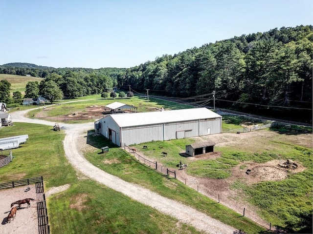 birds eye view of property featuring a rural view