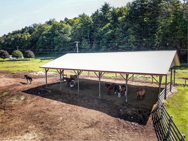 view of community with a rural view and an outdoor structure