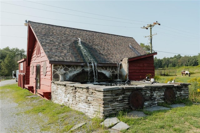 exterior space with a yard