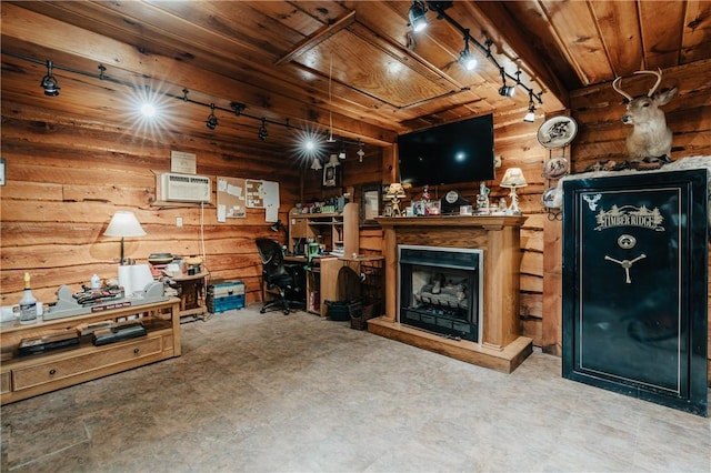 living room featuring wood ceiling and a wall mounted AC