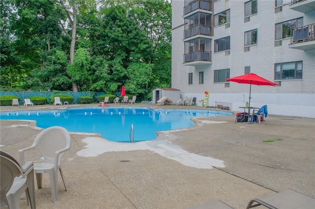 160 Academy St Unit 9L, Poughkeepsie, NY 12401 - community pool featuring a patio area