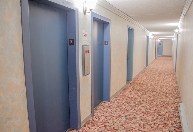 160 Academy St Unit 9L, Poughkeepsie, NY 12401 - hall with elevator, ornamental molding, and carpet flooring