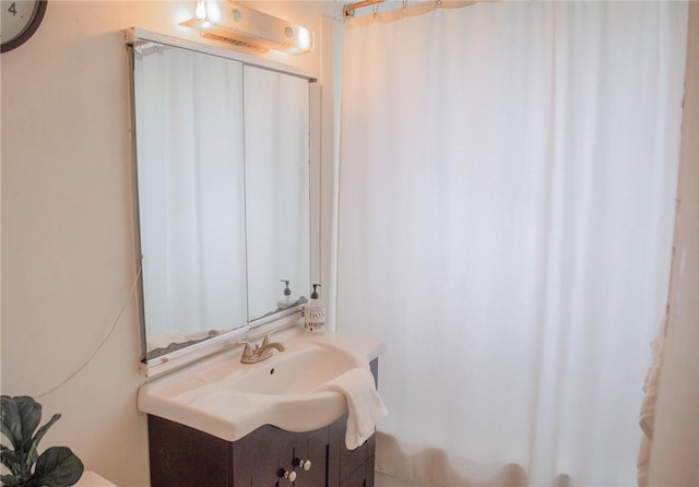 160 Academy St Unit 9L, Poughkeepsie, NY 12401 - full bathroom featuring vanity and a shower with curtain