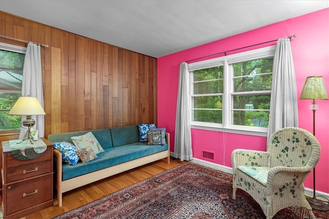 living area with wood-type flooring