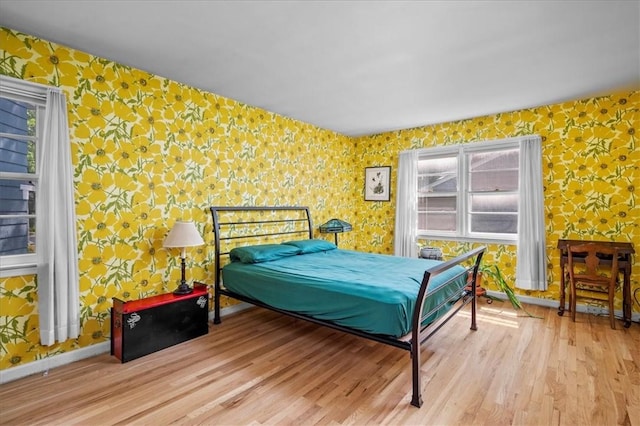 bedroom with light wood-type flooring