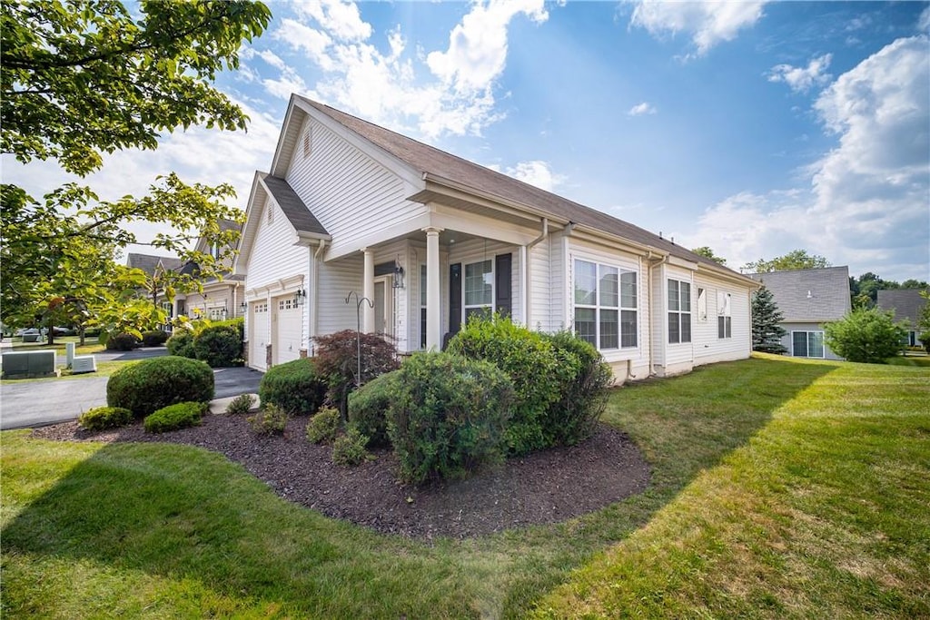 view of property exterior featuring a yard