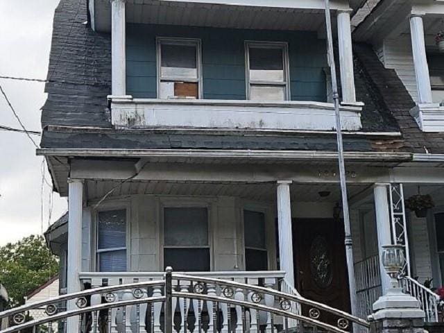 doorway to property with a porch