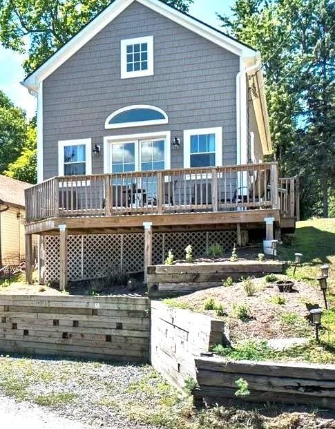 rear view of house with a deck