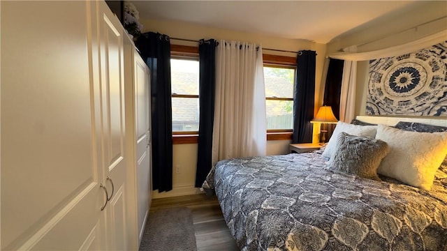 bedroom featuring dark hardwood / wood-style floors