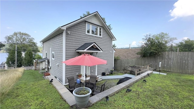 view of property exterior featuring a lawn