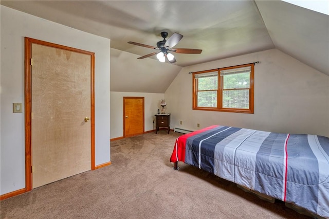 carpeted bedroom featuring ceiling fan, a baseboard radiator, and vaulted ceiling