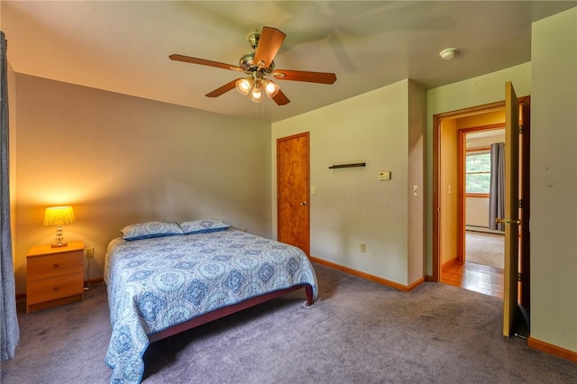 carpeted bedroom with ceiling fan