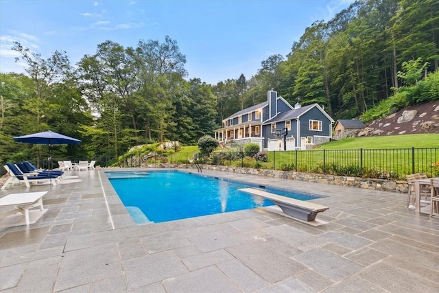 25 Red Oak Ln, Garrison, NY 10524 - view of swimming pool featuring a patio area and a diving board