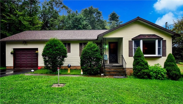 single story home featuring a front lawn and a garage