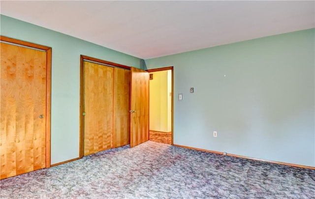 unfurnished bedroom featuring carpet floors