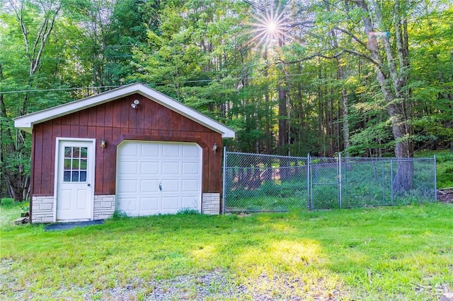 garage with a lawn