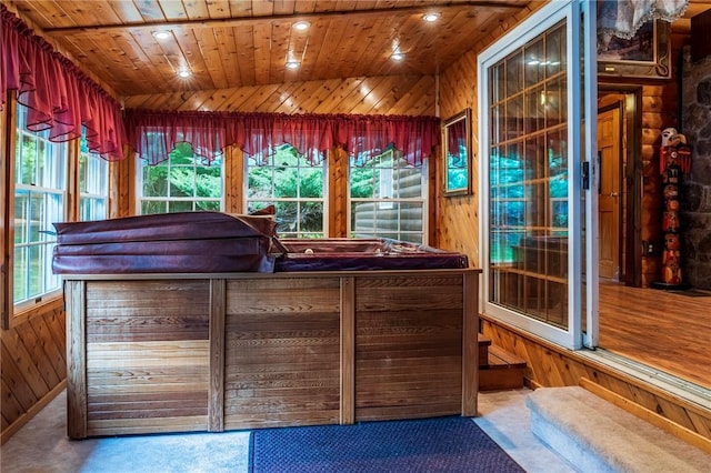 interior space with a jacuzzi and wooden ceiling