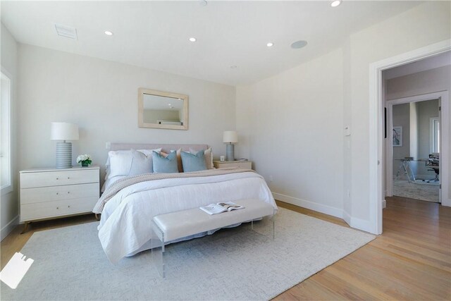 bedroom featuring light hardwood / wood-style flooring