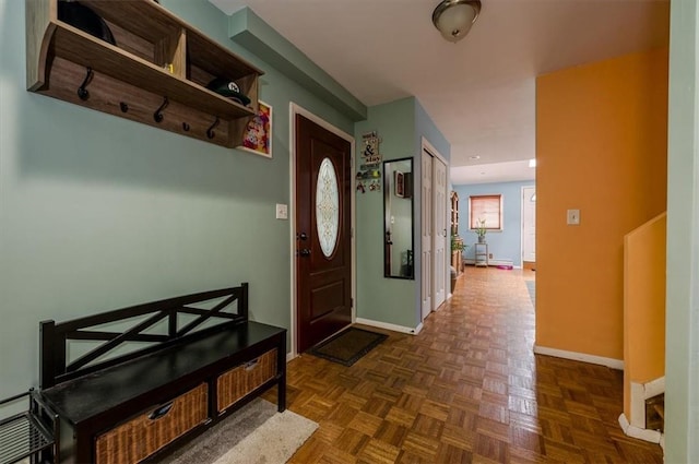 entrance foyer with dark parquet floors