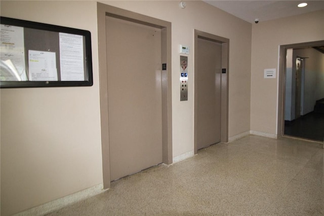 corridor featuring elevator