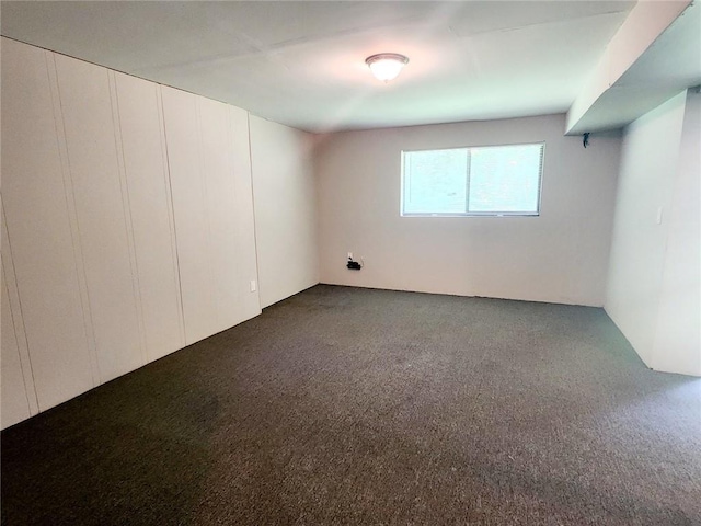 spare room featuring carpet flooring