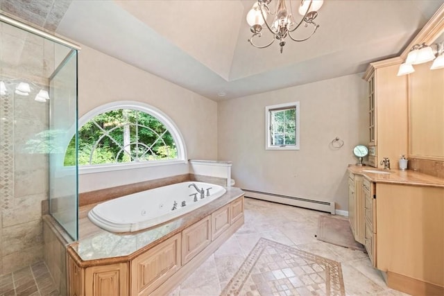 bathroom with plus walk in shower, a healthy amount of sunlight, and a baseboard heating unit