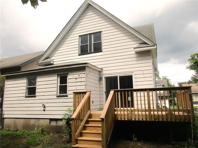 rear view of property with a deck