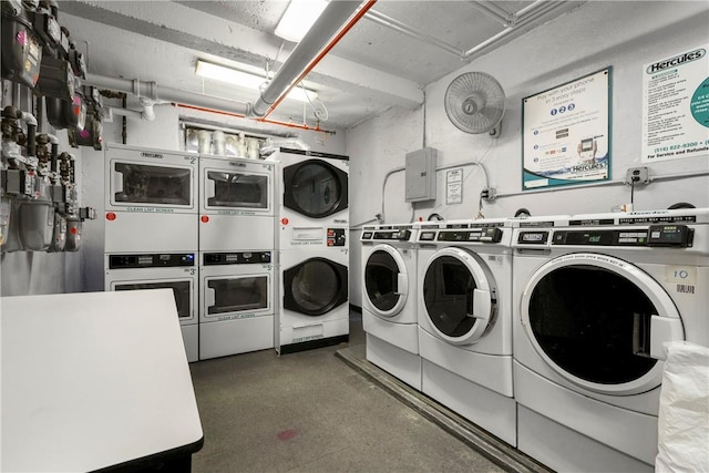 laundry area with stacked washer / drying machine and independent washer and dryer