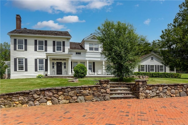 colonial house with a front yard