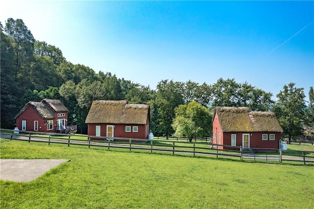 view of yard with a rural view