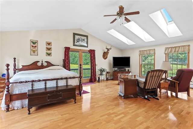 bedroom with access to exterior, ceiling fan, lofted ceiling, and light wood-type flooring