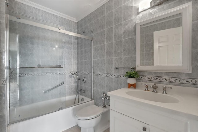 full bathroom featuring backsplash, ornamental molding, vanity, shower / bath combination with glass door, and tile walls