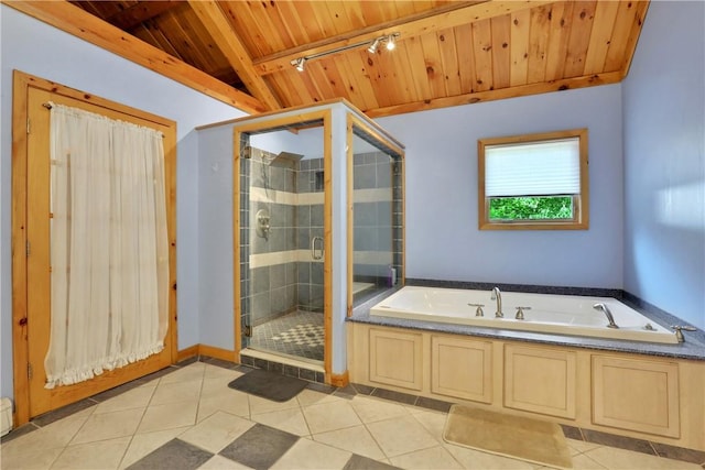 bathroom with tile patterned floors, lofted ceiling with beams, plus walk in shower, and wooden ceiling