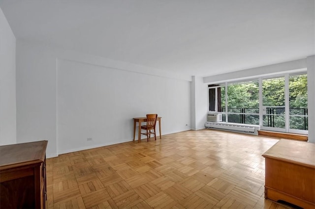 2727 Palisade Ave Unit 7B, Bronx, NY 10463 - unfurnished living room with baseboard heating