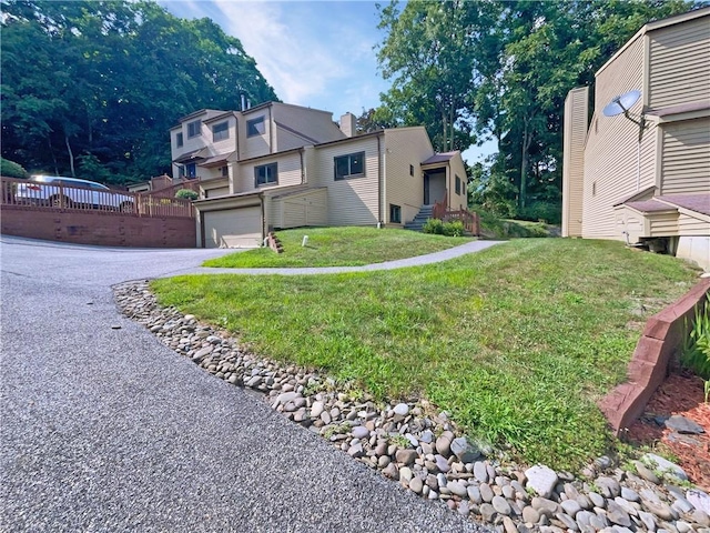 view of yard featuring a garage