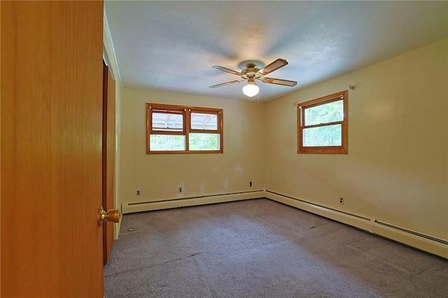 unfurnished room featuring baseboard heating, light carpet, and ceiling fan