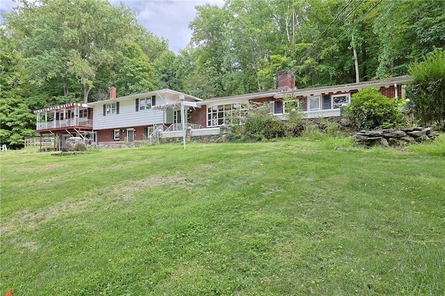 view of yard with a deck