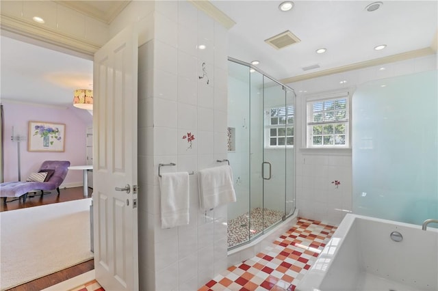 ensuite bathroom with visible vents, a stall shower, ensuite bathroom, crown molding, and a whirlpool tub