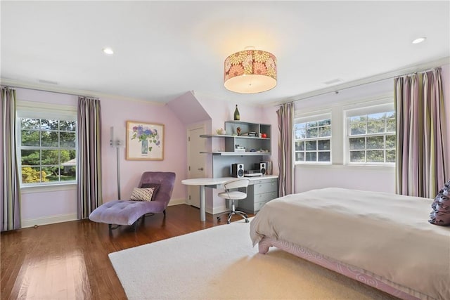 bedroom featuring recessed lighting, wood finished floors, and baseboards