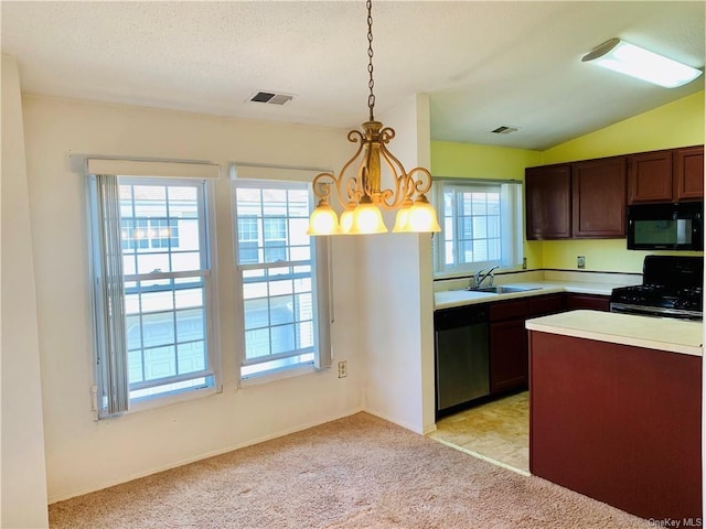 kitchen with a wealth of natural light, light colored carpet, hanging light fixtures, and black appliances