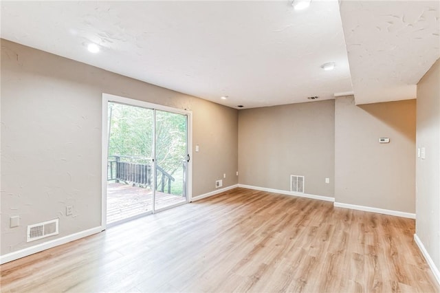 empty room featuring light hardwood / wood-style floors