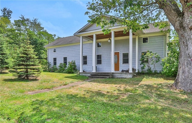 view of front of home with a front yard